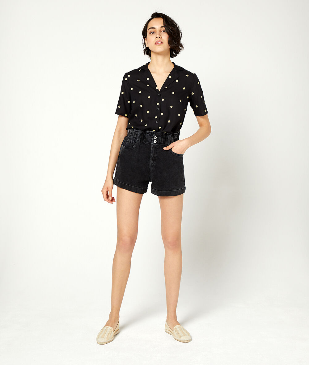 Blusa estampado de topos negro.