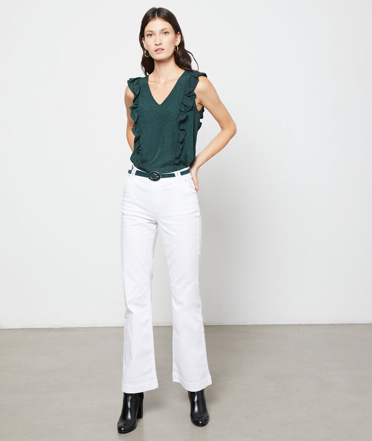 Blusa plumetis con volantes verde.