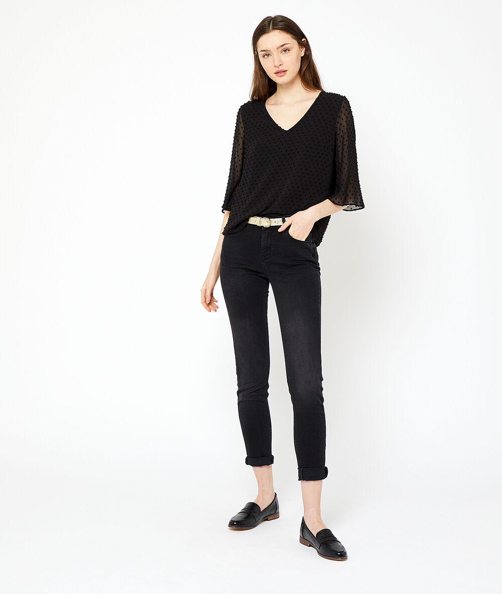 Blouse en plumetis noir.