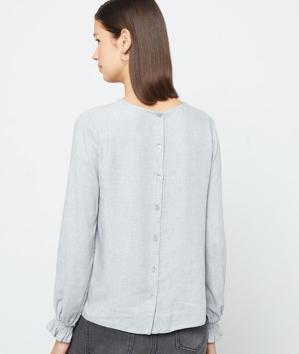 Blusa con la espalda abotonada Blusa con la espalda abotonada