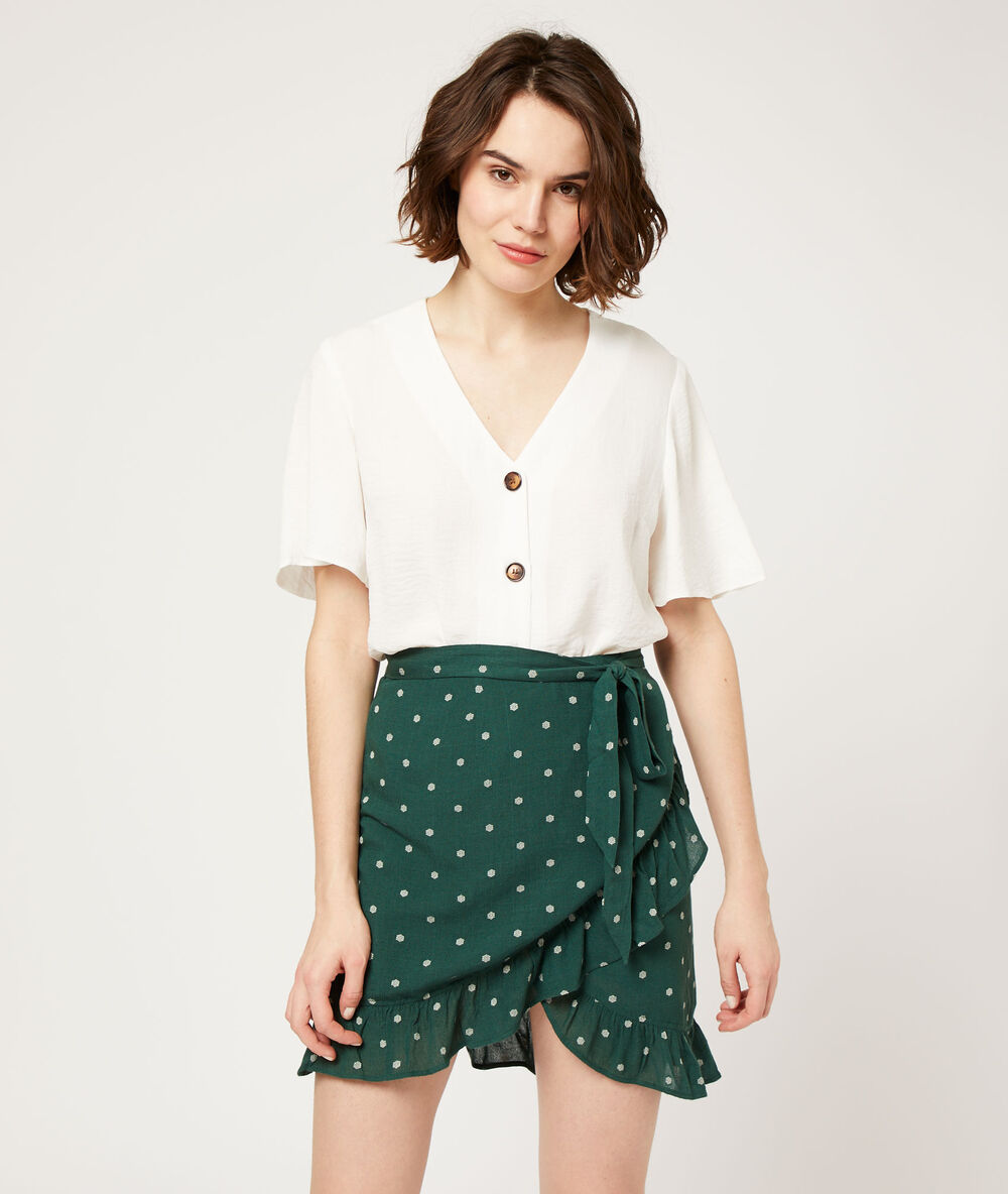 Falda con volantes, estampado de lunares turquesa.