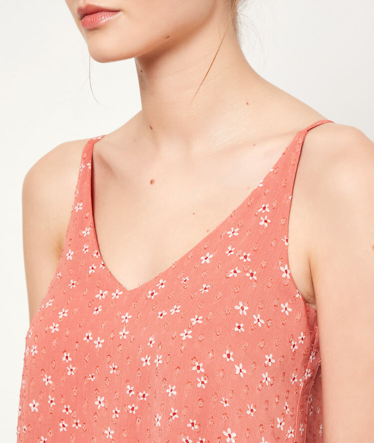 Top estampado floral rosa.