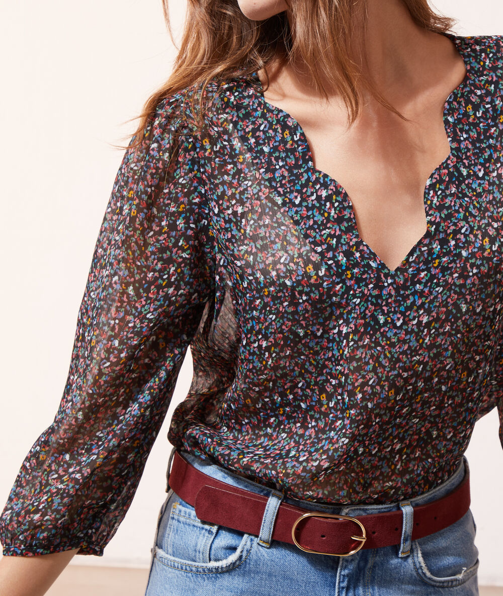 Blusa estampado confeti negro.