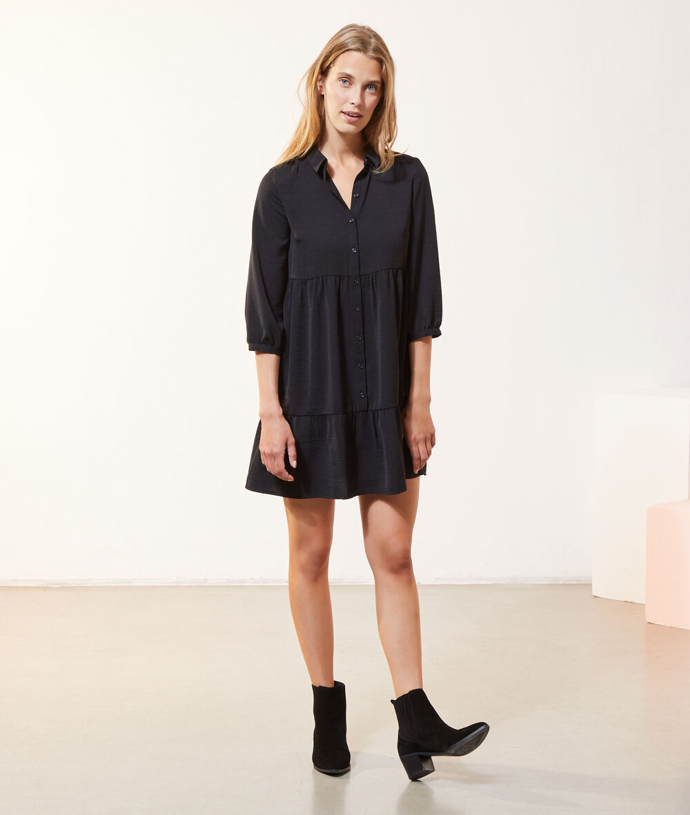 Vestido vaporoso negro.